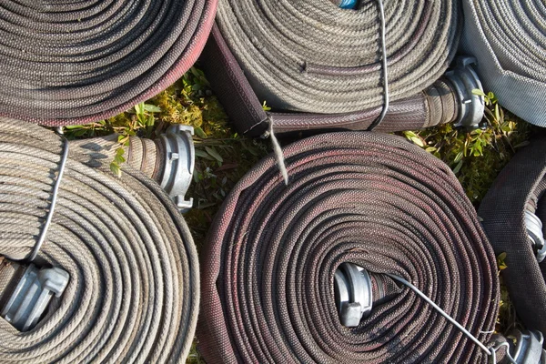 Rolled-up fire hoses