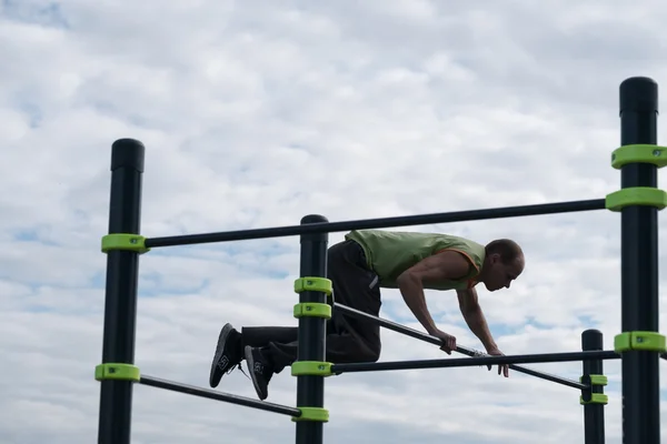 Man practice street workout