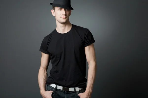 Young handsome guy in black t-shirt.