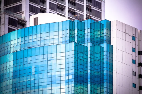 Windows of office buildings, cool business background in Bangkok