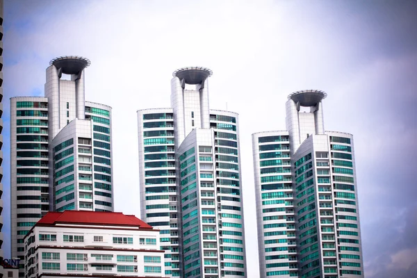 Windows of office buildings, cool business background in Bangkok