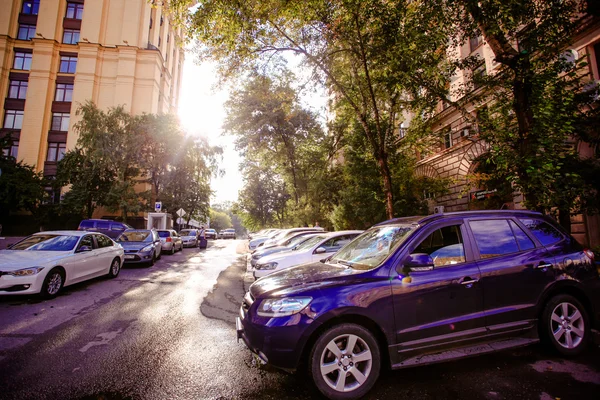 RUSSIA, 8 AUGUST 2014, Photo of parking cars in Moscow city and sunlight