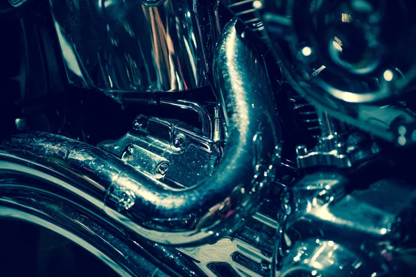 Close up view of a shiny motorcycle engine. Macro
