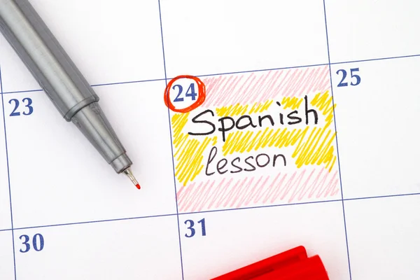 Reminder Spanish lesson in calendar with pen