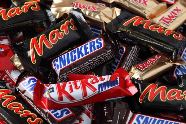 Snickers, Mars, Twix, Kit Kat minis candy bars heap