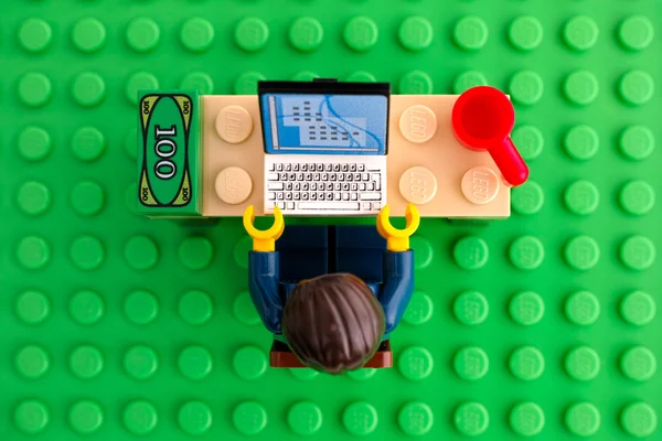 Lego businessman at his working place