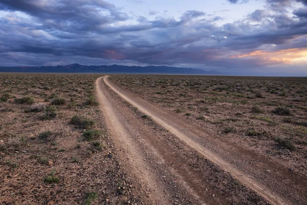 Turn of rural road in desert
