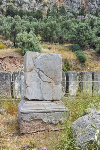 Ancient column in Ancient Greek archaeological site of Delphi