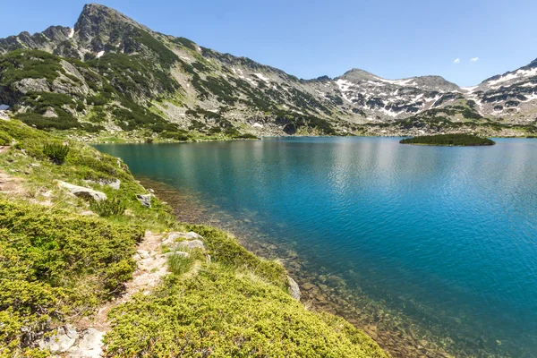 Sivrya peak and clear waters of Popovo lake, Pirin Mountain