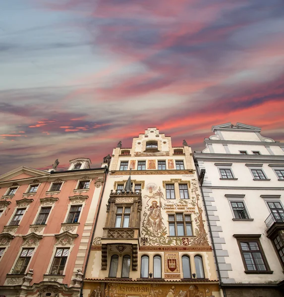 Old town houses in Prague, Czech Republic. On the facade of the inscriptions with the names of the architects, the name of an antique shop and the motto of the owner in the Roman language