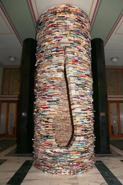 PRAGUE, CZECH REPUBLIC-  NOVEMBER 13, 2014:  Round book shelf in the hall of Municipal Library of Prague in Czech Republic. Prague's Library comprised of 42 branches, 2 mobile libraries and 344,000 books