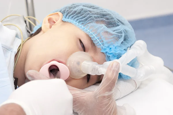 Child patient receiving artificial ventilation