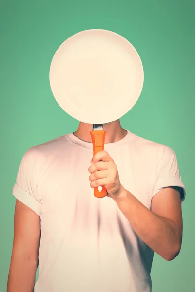 Man with a blank pan