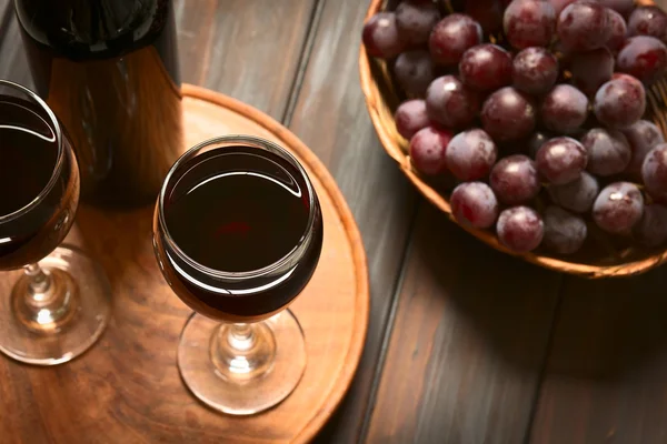 Red Wine in Glass with Grapes