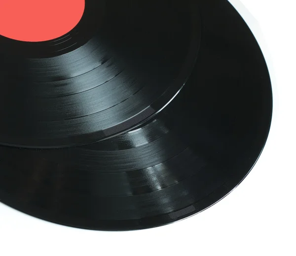 Two  black long-play vinyl records isolated closeup