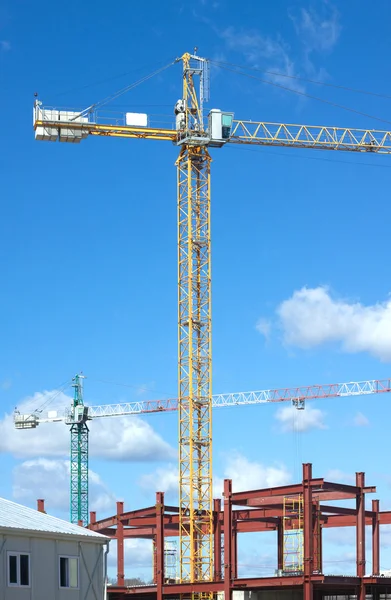 Tower cranes on industrial building construction
