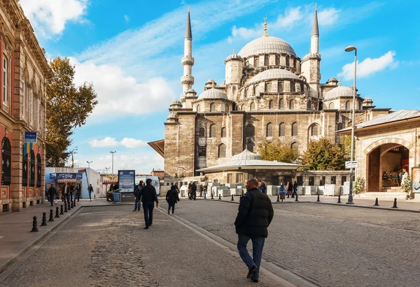 ISTANBUL , TURKEY.  View Yeni Cami New Mosque one of the most famous landmarks of Istanbul City located in old town near the Egyptian Bazaar with people around it.