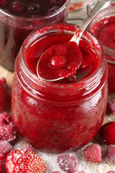Jam in jar and spoon