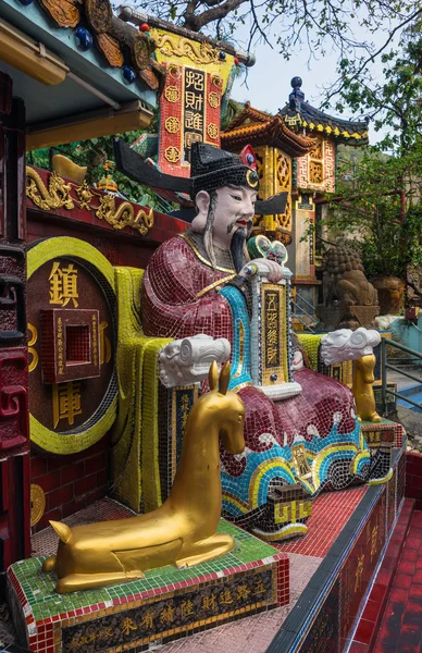 God of wealth mosaic statue in the Tin Hau Temple, Repulse Bay, Hong Kong, China