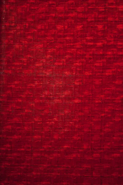 Red carbon fiber texture, closeup view
