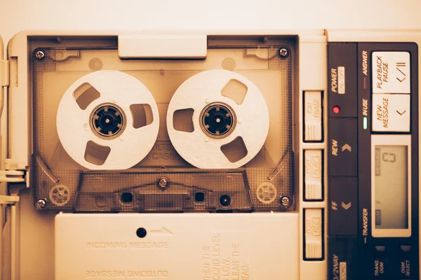 Vintage audio tape compact cassette, sepia tone with artistic film noise