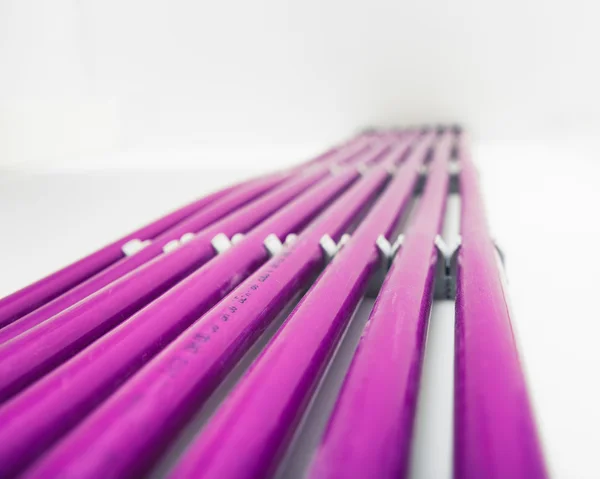 Purple plastic pipes of underfloor heating system