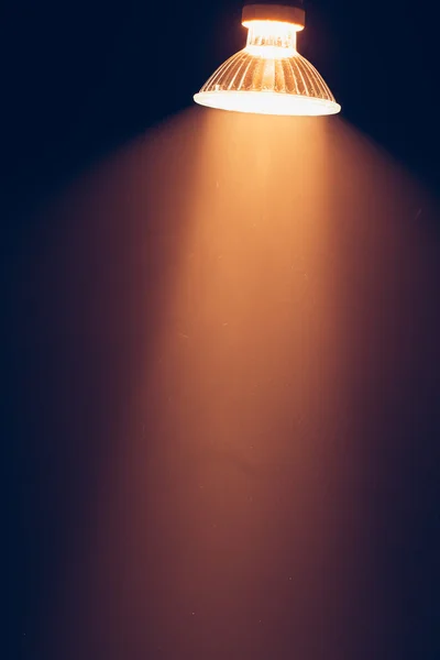 Halogen lamp with reflector, warm light in haze