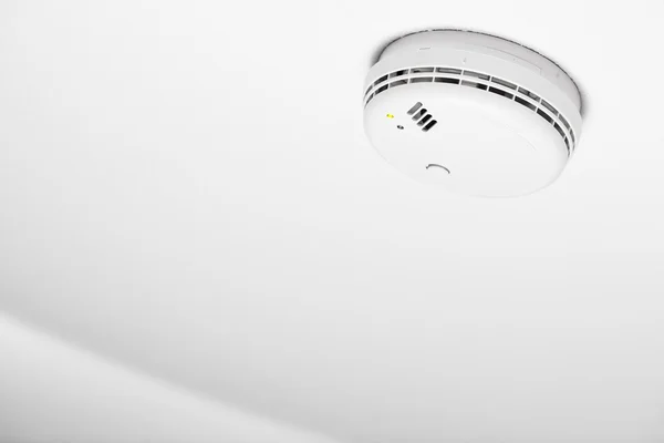 Smoke detector of fire alarm, white background