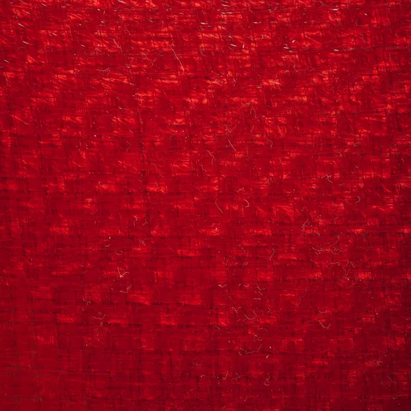 Red carbon fiber texture, closeup view