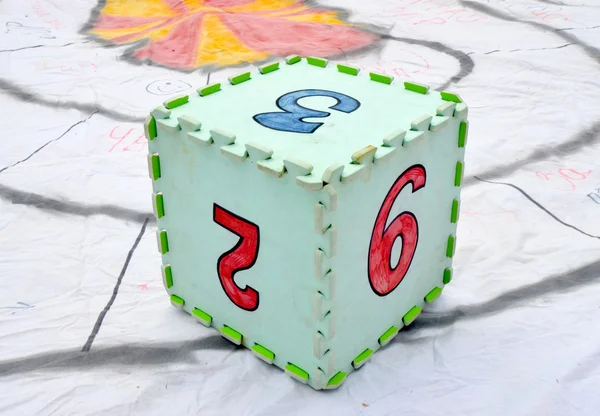 Fun colorful toy puzzle cube or dice in textured foam for kids to learn their numbers 2 , 3,9