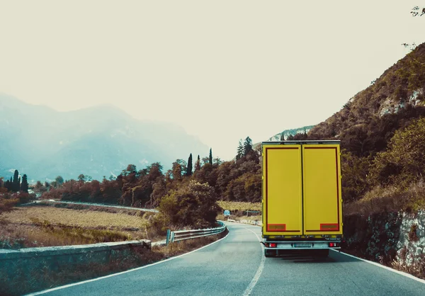 Yellow Truck on the road.