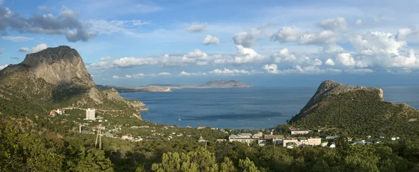 Sea coast with mountains and town