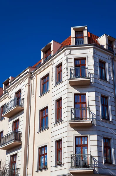 Windows on the facade of the Art Nouveau building in Poznan