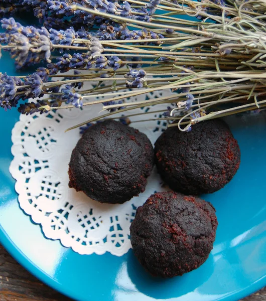 Chocolate  truffles with lavender on a plate