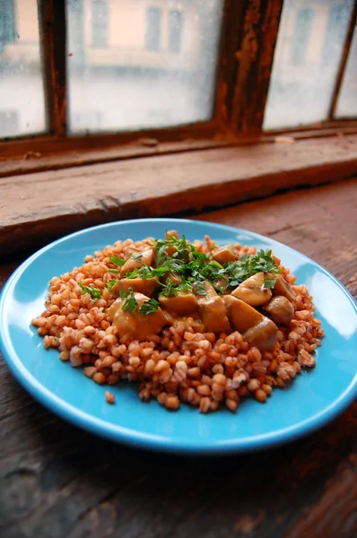 Closeup of Pearl barley salad with grilled mushrooms