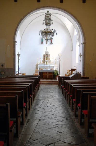 Interior view of a church with empty pews