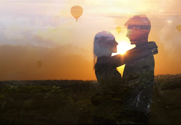 Double exposure of young couple in love.