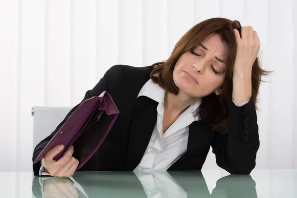 Sad Businesswoman Holding Empty Purse