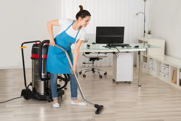 Female Janitor Cleaning Floor