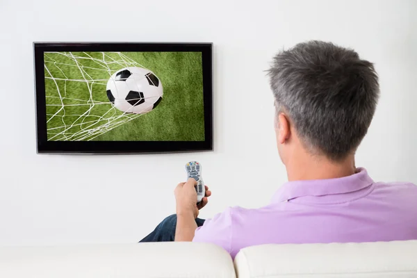Man Watching Soccer Game
