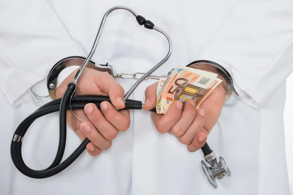 Doctor With Euro Bank Notes