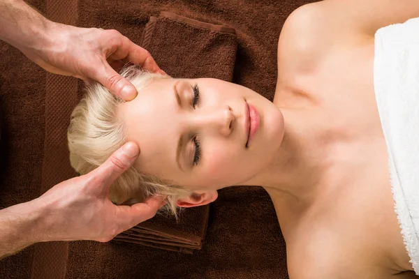 Woman Receiving Head Massage