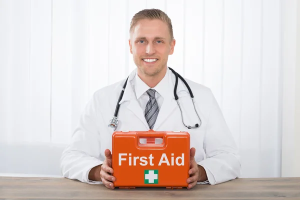 Doctor Holding First Aid Kit