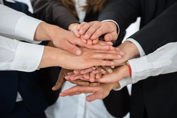 Businesspeople Hands Stacking Together