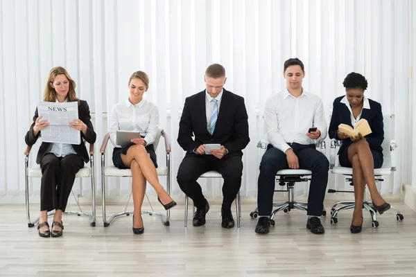 Businesspeople Waiting For Interview