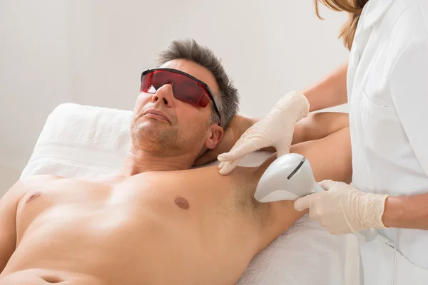 Man Receiving Laser Hair Removal