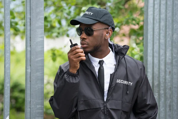 Security Guard Using Walkie-Talkie