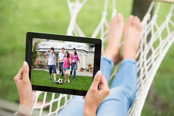 Woman Watching Movie On Digital Tablet