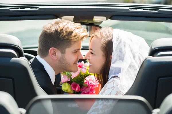 Newlyweds Young Couple Kissing In The Car