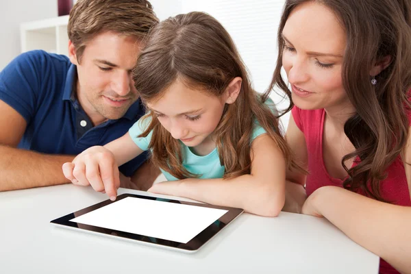 Family Using Digital Tablet